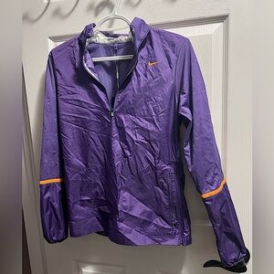 NEW WITH TAGS WOMEN’S NIKE GOLF WINDBREAKER